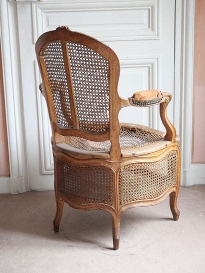 A molded and carved beechwood cabriolet-shaped...