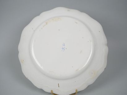 STRASBOURG
Earthenware rimmed dish with polychrome...