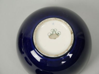 SEVRES
Reunion of 4 small blue porcelain...