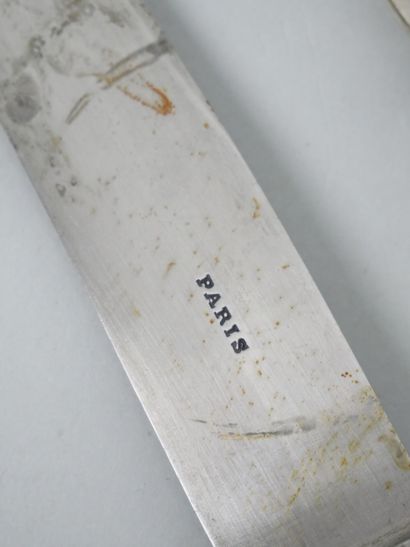 Silver flatware with ribbon and laurel leaf...