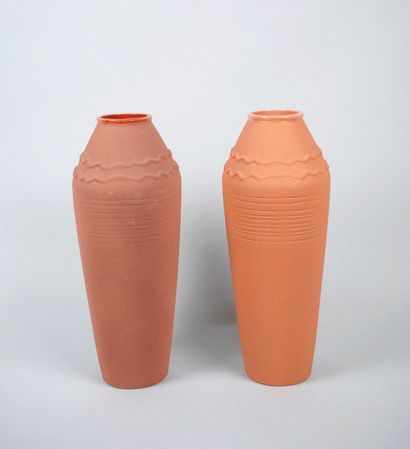 Reunion of two terra cota earthenware vases...