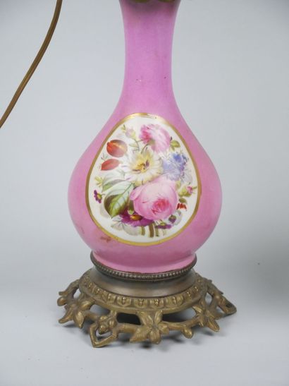 Pair of porcelain oil lamps with polychrome...
