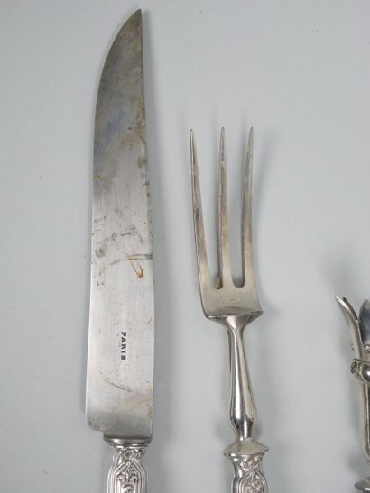 Silver flatware with ribbon and laurel leaf...