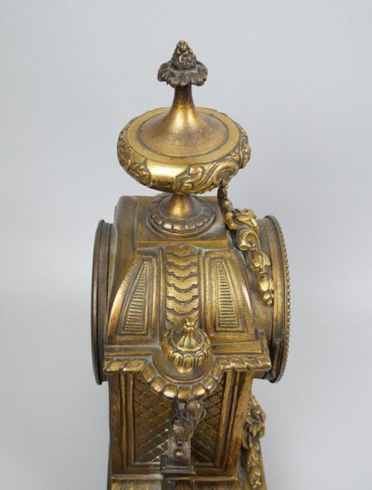 Gilt bronze clock, painted Roman numeral...