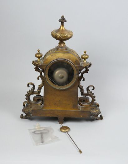 Gilt bronze clock, painted Roman numeral...