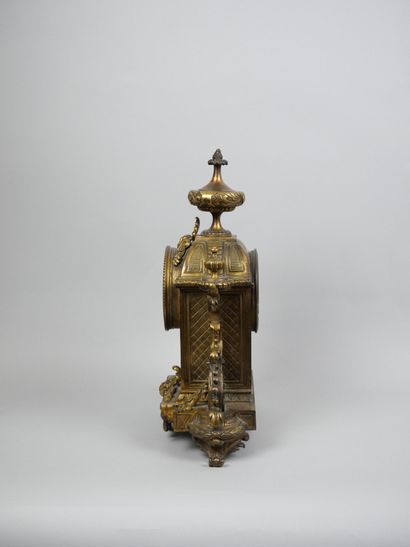 Gilt bronze clock, painted Roman numeral...
