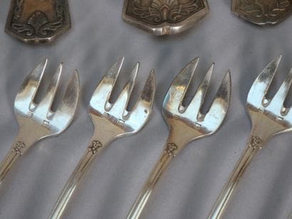 Part of a white metal menagère, spatula model...