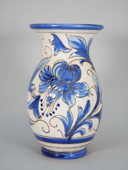 ITALY
An enameled majolica baluster vase...