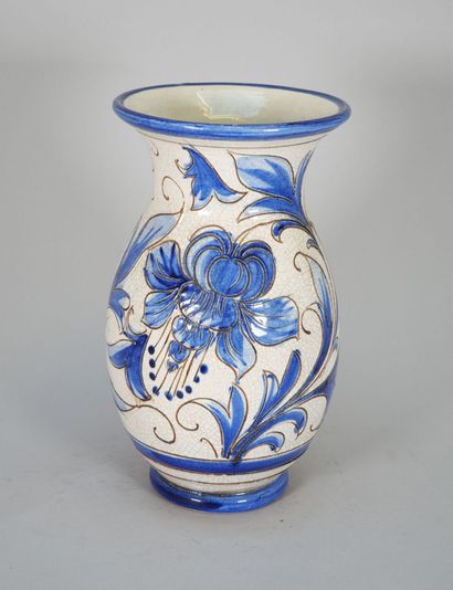 ITALY
An enameled majolica baluster vase...