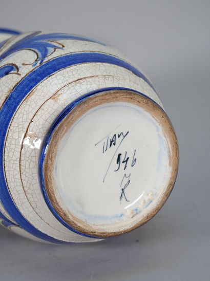 ITALY
An enameled majolica baluster vase...