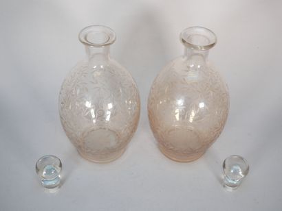 Pair of belly-shaped crystal decanters with...