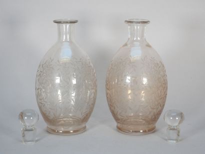 Pair of belly-shaped crystal decanters with...