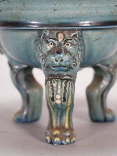 Earthenware tripod bowl with turquoise background,...