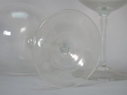 Pair of large glasses on pedestal in engraved...
