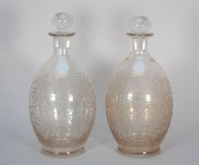 Pair of belly-shaped crystal decanters with...