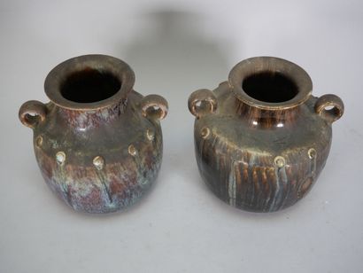 Pair of flared-neck baluster vases in shaded...