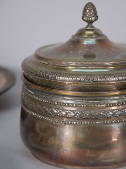 Set of silver-plated metal parts including...