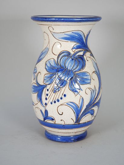 ITALY
An enameled majolica baluster vase...