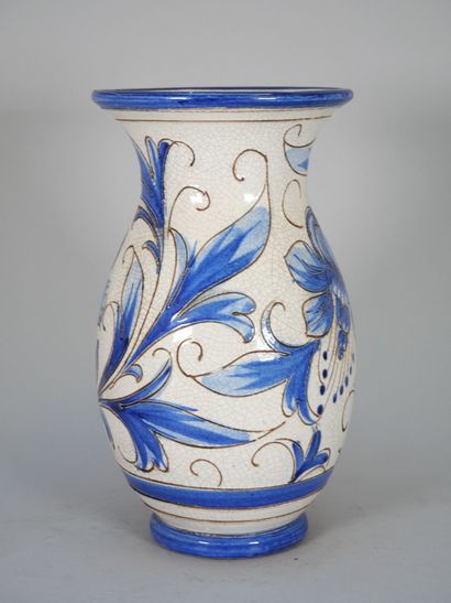 ITALY
An enameled majolica baluster vase...