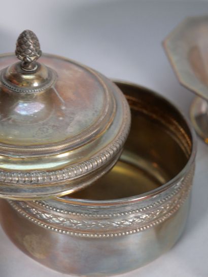 Set of silver-plated metal parts including...