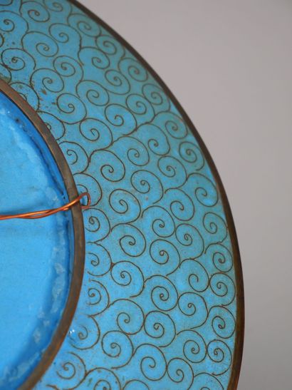 CHINA
Enameled porcelain dish decorated in...