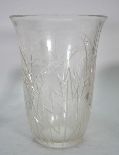 Crystal vase with flared neck and cut decoration...