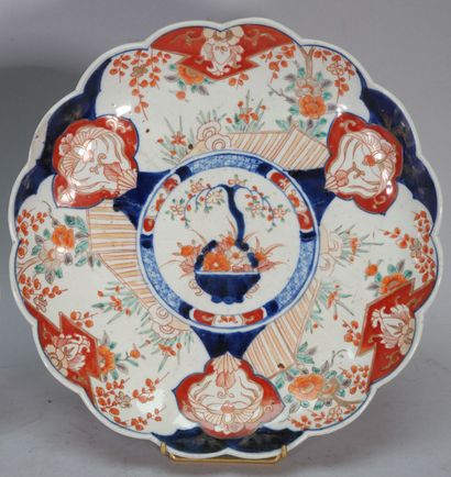 JAPAN
Large circular dish with moving contours...