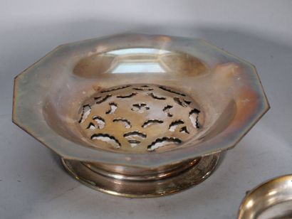Set of silver-plated metal parts including...
