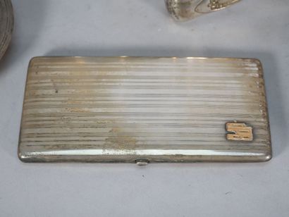Set of silver-plated metal parts including...