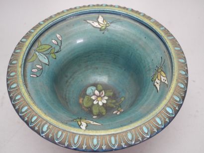 Earthenware tripod bowl with turquoise background,...