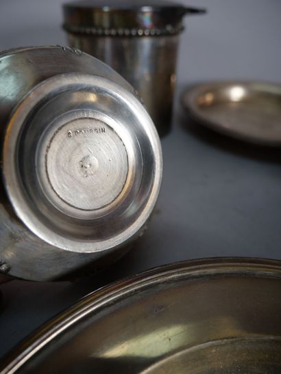 Set of silver-plated metal parts including...