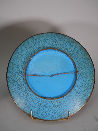 CHINA
Enameled porcelain dish decorated in...