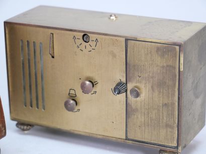 BAYARD
Pendule borne de forme demi-lune en...