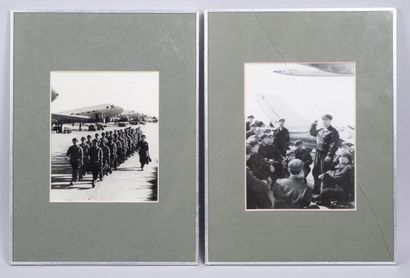 Two black-and-white photographs framed under...