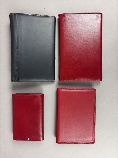 Set of two red leather wallets decorated...