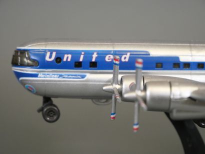 Quatre avions miniatures : Dornier Do-X en...