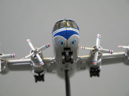 Quatre avions miniatures : Dornier Do-X en...