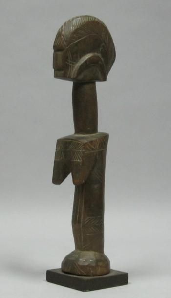 Afrique*
Figure féminine en bois sculpté....