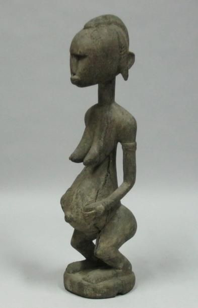 Afrique*
Femme enceinte en bois sculpté....