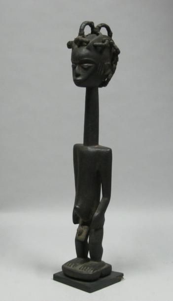 Afrique*
Figure masculine au long cou en...
