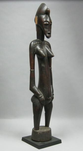 Afrique*
Figure féminine en bois sculpté....