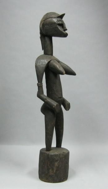 Afrique*
Figure féminine en bois sculpté....
