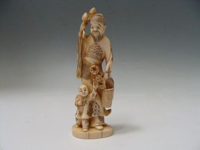 JAPON
Okimono en ivoire représentant un homme...