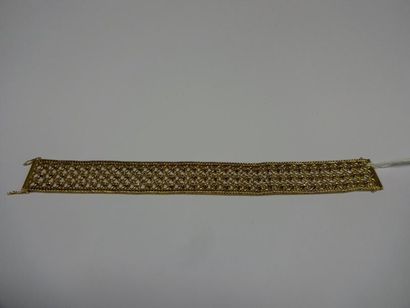 BRACELET en or, mailles fantaisie. Poids...
