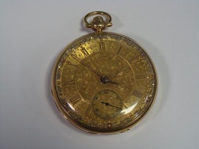 MONTRE CHRONOMETRE en or guilloché, le cadran...
