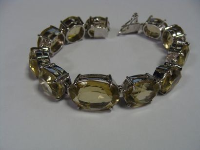 BRACELET en argent orné de citrines. Long:...