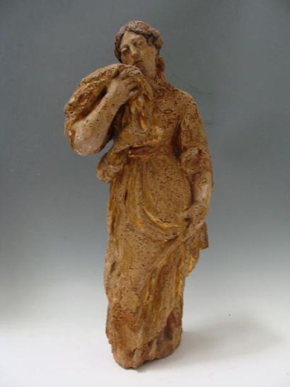 SAINTE éplorée en tilleul sculpté, partiellement...