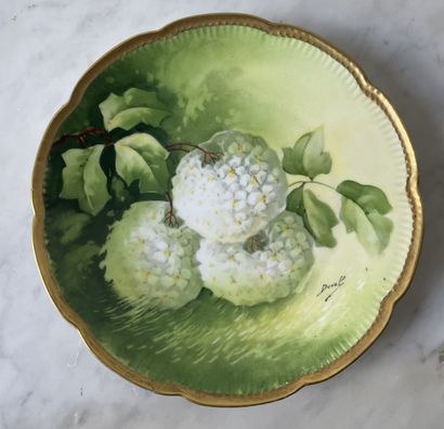 Three decorative plates in hand-painted Limoges...