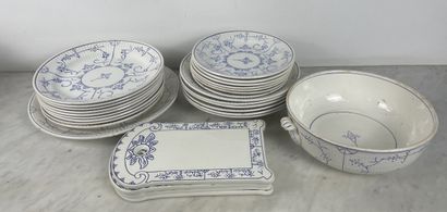 Large earthenware dinner service with blue...