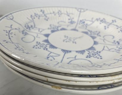 Large earthenware dinner service with blue...